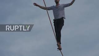France: Slackliner Paulin completes 600-metre walk from Eiffel Tower in front of amazed crowds