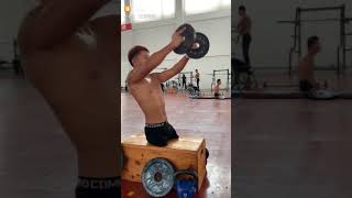 Legless amputee guy doing exercises in the gym