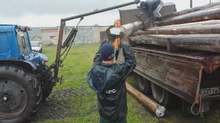 Трактор МТЗ-80 грузим сруб!