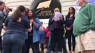 Protesters interrupt Attorney General Janet Mills at anti-Trump rally