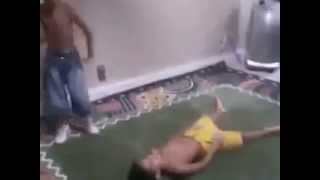 two young boys wrestling
