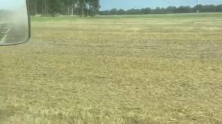 John Deere 8320R mit Bednar Strohstriegel PRO PE12000