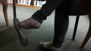 Candid Asian feet dangling shoeplay