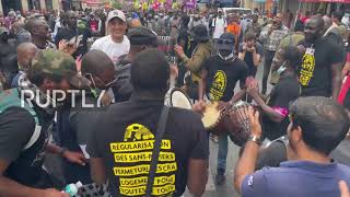 France: Hundreds march in Paris in support of undocumented migrants