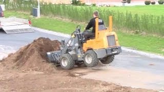 Loading Container With Dirt Using A Giant D262S