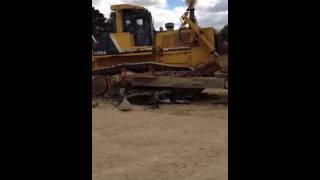 Bulldozer vs car ( Don't drink drive )