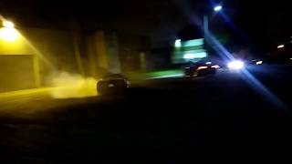 Corvette does some donuts on track tires