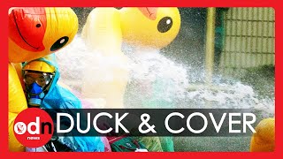 Thailand Protests: Demonstrators Use Inflatable Ducks Against Police Water Cannons