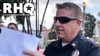 Cop HUMILIATES Himself In Front Of Activists