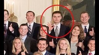 Former White House intern flash 'white power' hand gesture in photo with Trump