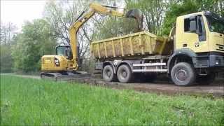 CAT 308E loading IVECO Eurotrakker