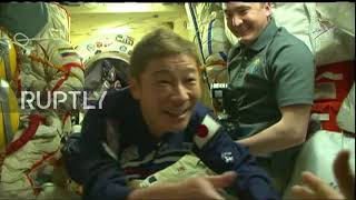 ISS: Cosmonauts welcome Japanese tourists at space station