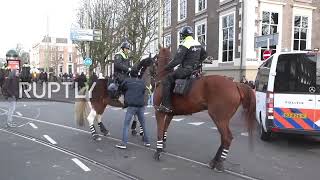 Netherlands: Police scuffle with "Freedom Convoy" protesters in The Hague