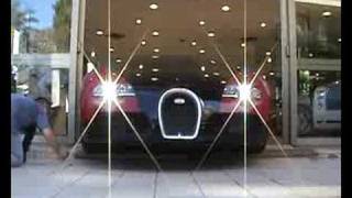 Difficult parking of a red Bugatti Veyron in Monaco - www.LuxCars.ch