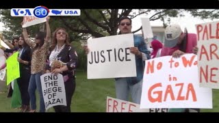 Những nhà hoạt động biểu tình ủng hộ 2 bên trong cuộc chiến ở Dải Gaza