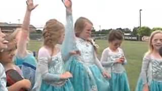 Girls T-Ball Team Plays Dressed As Elsa From "Frozen" (CNN)