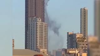 Water spills over from penthouse pool during earthquake