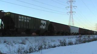 BNSF GP28P 1542 and a BNSF GP28M 1538 lead the Hinckley south down to CoonCreek Jct