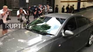 Australia: Cars leave lawyer's office after tennis star Djokovic wins case