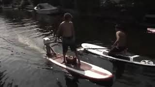 sup with outboard engine
