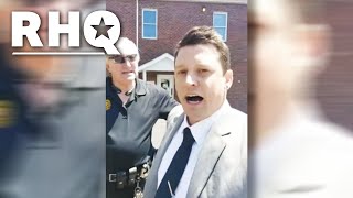 Reporter Schools Officer On The Law DURING 'Live' Report