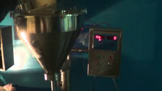 FG500L фасовка какао на шнековом дозаторе.