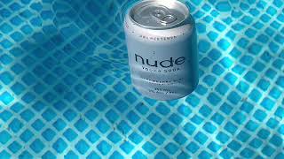 FLOATING NUDE IN THE POOL