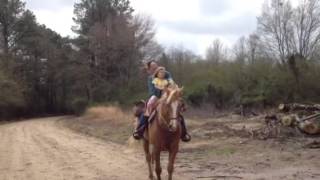 Isabella riding a horse