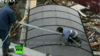 Running from Tsunami: Dramatic rescue video of moments when water hit Japan