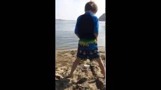 Boy PEES on public beach in broad daylight!