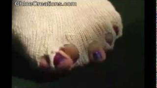 Girl's Foot Growing Out Of Her Shoe And Sock
