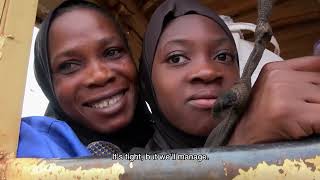 Formula 1 driving with junk trucks in Ivory Coast