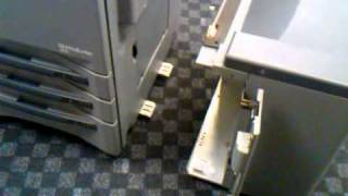 Removing Tray from Copiers