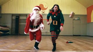 Santa Claus and his Elf vs the Grinch