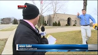 Watch a Bank Robber Interrupt This News Reporter During Live Broadcast
