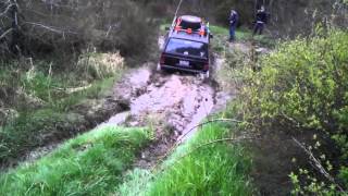Jeep Cherokee in deep mud