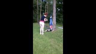 Girl being hung by a tree