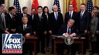 Trump signs 'phase one' of China trade deal