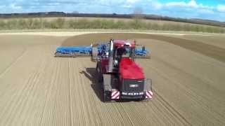 Case Quadtrac 535 pulling a Dalbo Rollomaximum 12 meter precise seed bed cultivator