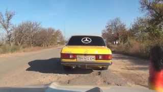 Mercedes Benz D200 followed by German Microcar on Ukrainian Road P33 Ukraine 2014