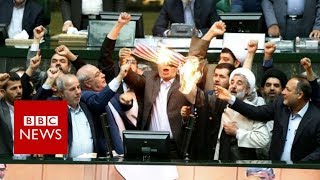 Iranian politicians set fire to US flag in parliament - BBC News