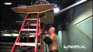 Kane pushes Paul Bearer off a ladder