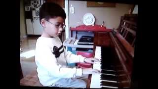 JB Tiotuico is playing Allegro Moderato at 4 years and a half