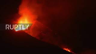 Spain: La Palma volcano continues spewing lava into night