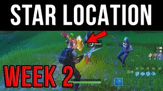 Search Between A Scarecrow, Pink Hot Rod, & Big Screen - Fortnite Week 2 Battlestar Location