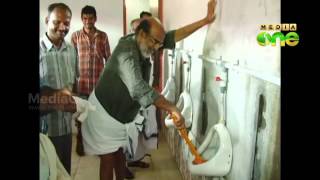 Thomas Isaac MLA gets down to cleaning school toilets with Panchayat members