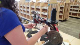Cobblers sewing machine in action.