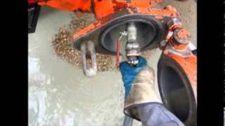 cleaning the concrete pump boomlines and hopper