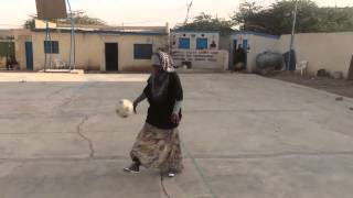 Somalian Girl playing soccer she has serious football skills