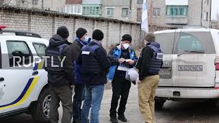 OSCE observers on site of damaged kindergarten building in Lugansk amid ceasefire breach concerns